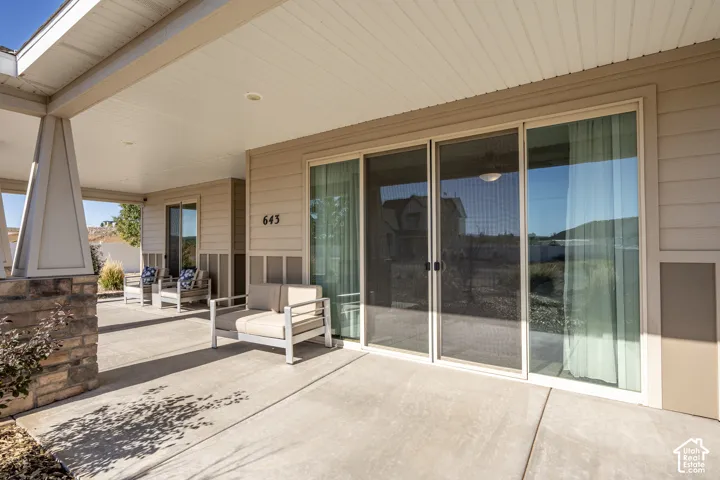 Covered patio with a concrete surface