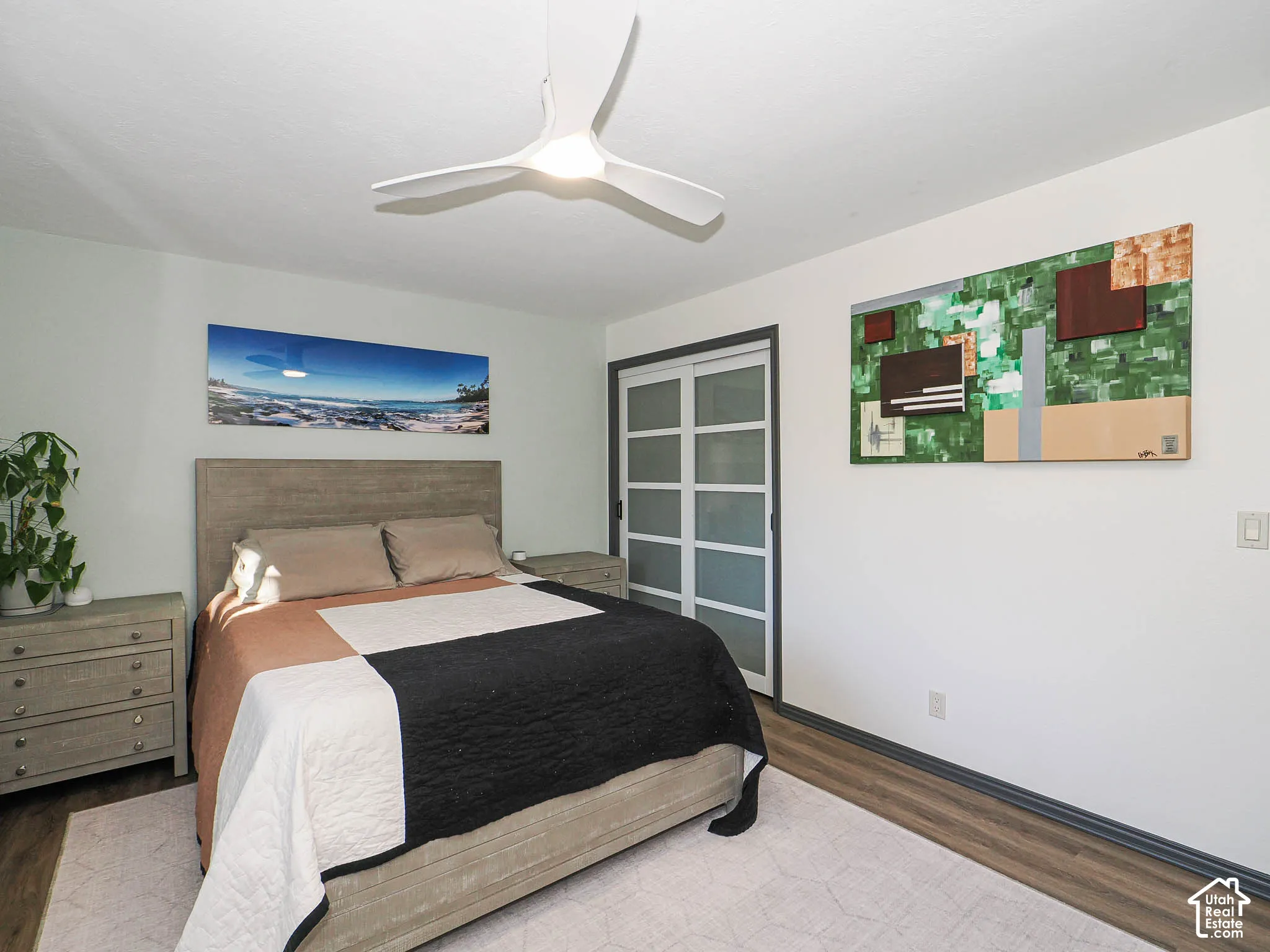 Wood-finish flooring, recessed lighting, and a modern ceiling fan