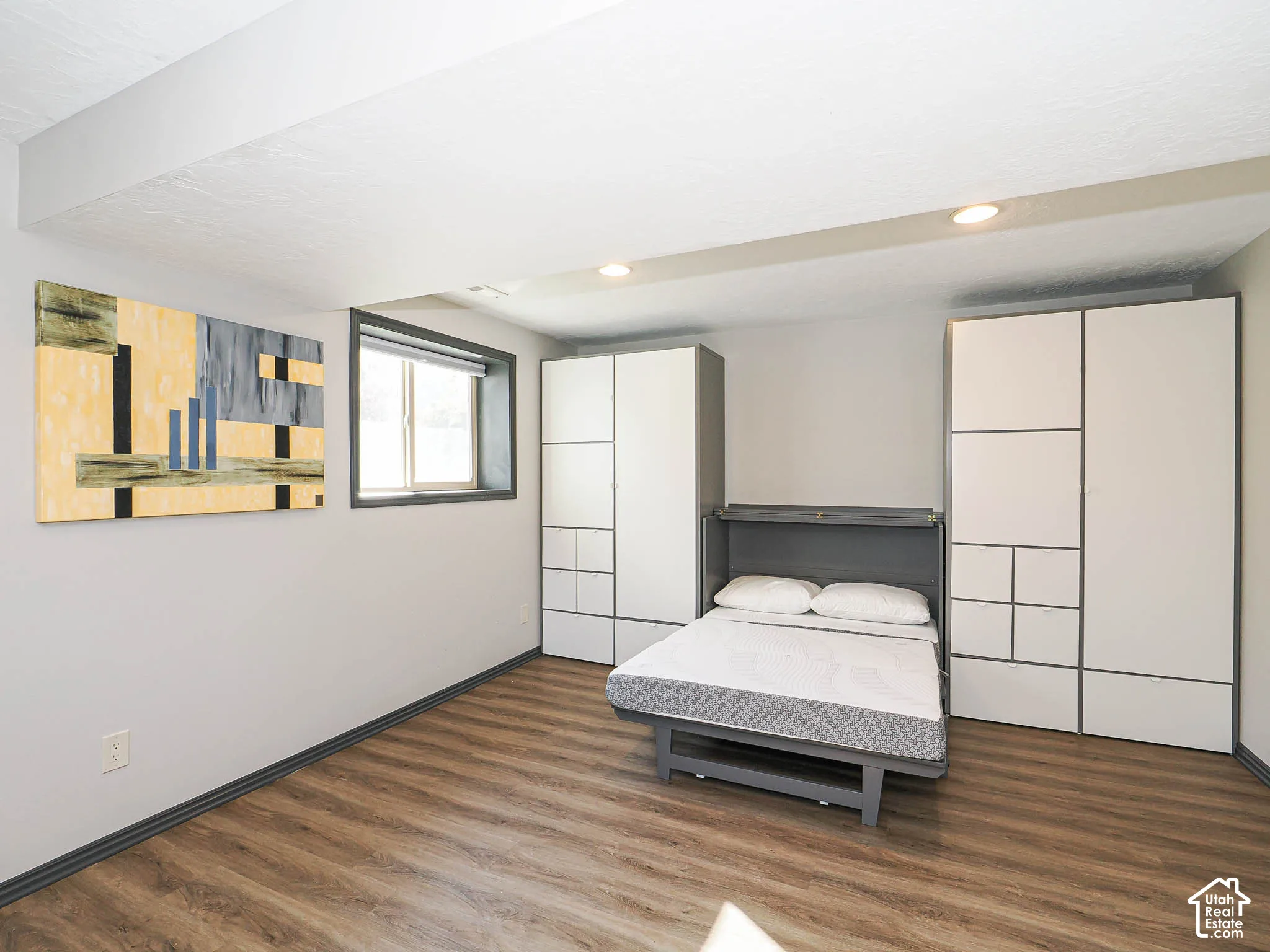 Wood-finish flooring with a low-profile window