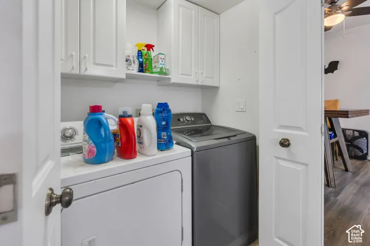 Built-in upper cabinetry and shelving provide storage