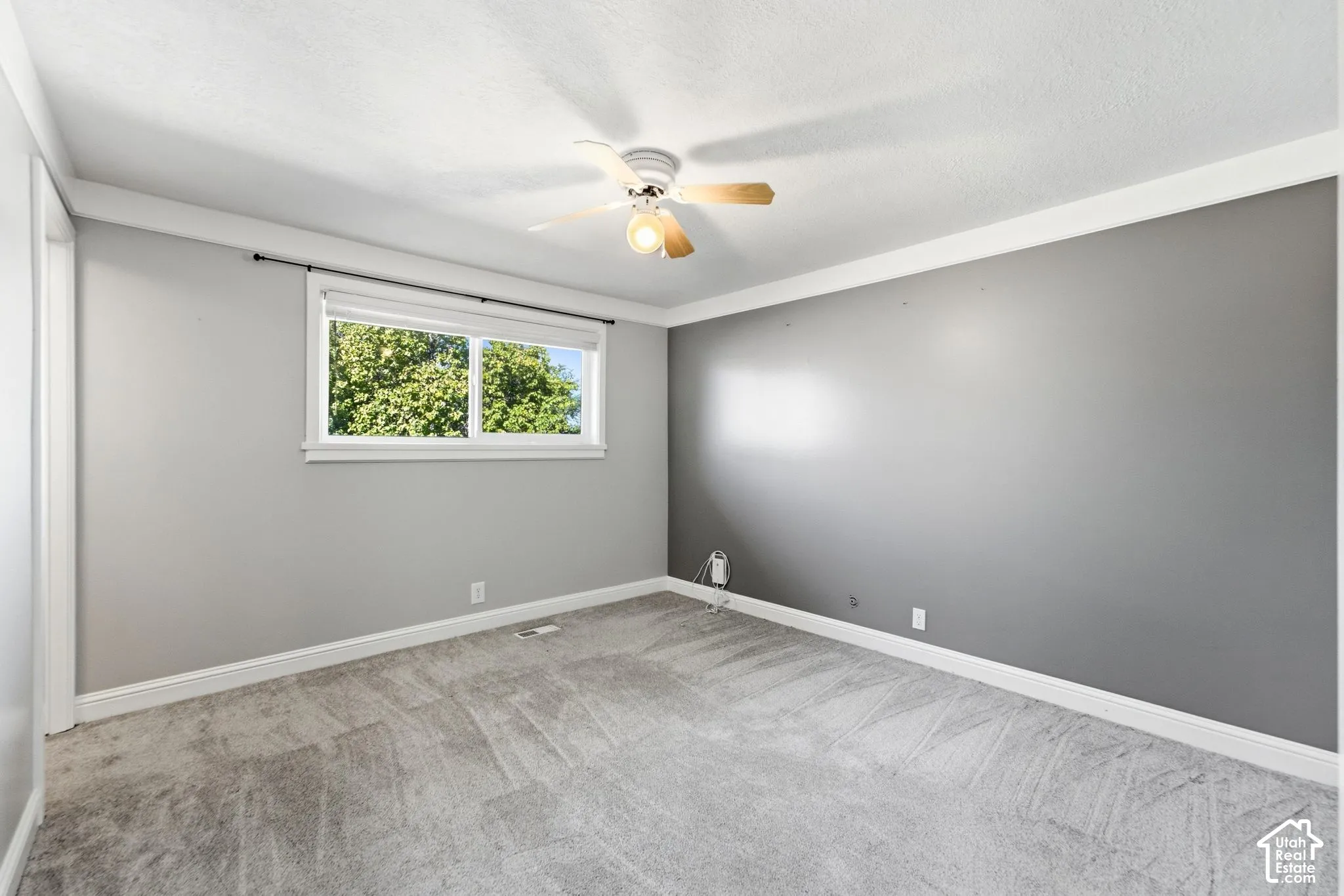 Recessed lighting, ceiling fan, carpeted flooring, window with white trim, and crown molding