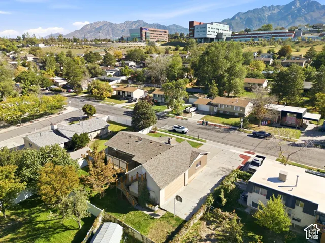 Expansive neighborhood setting with established streetscaping and mountain backdrop