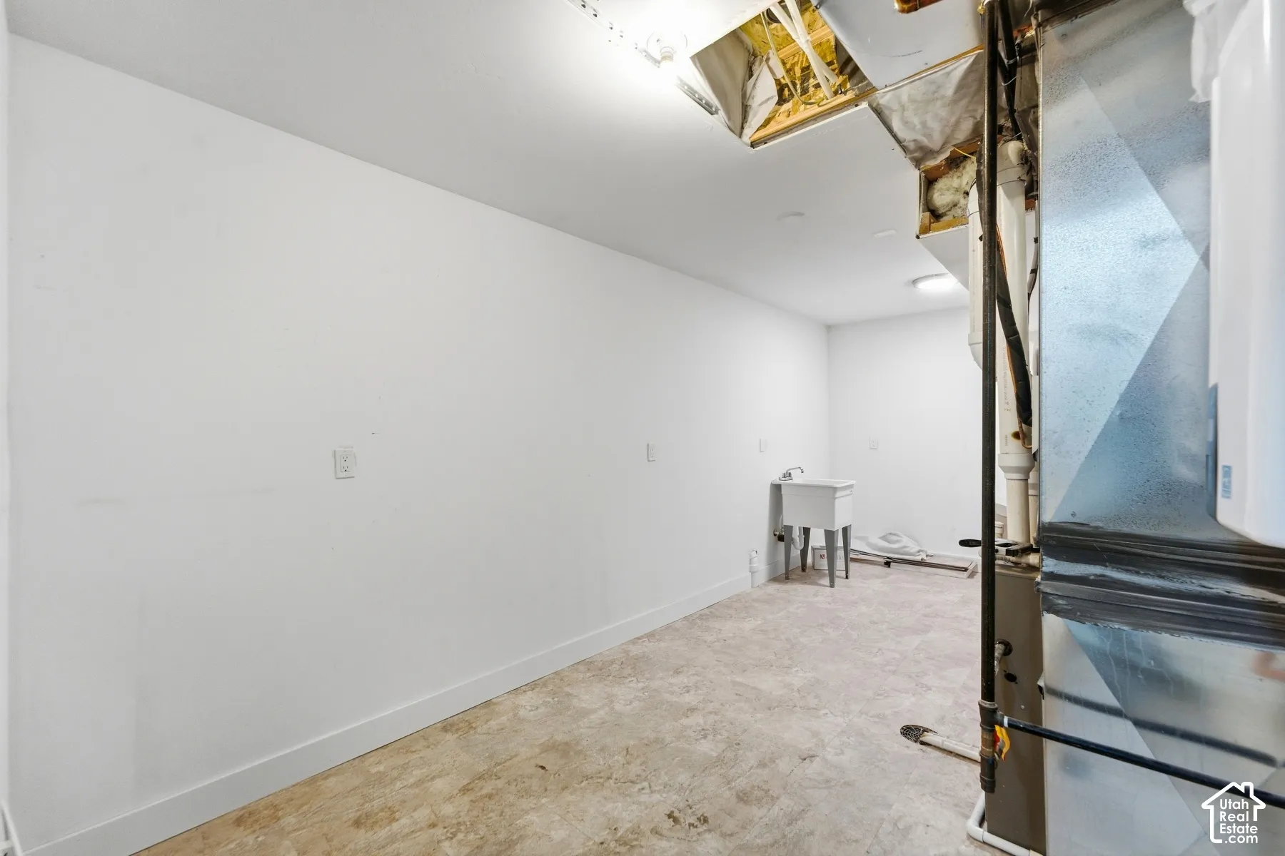 Concrete flooring and utility sink