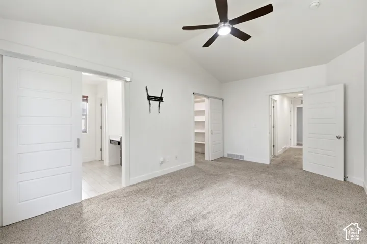 Vaulted ceiling with an attached ceiling fan
