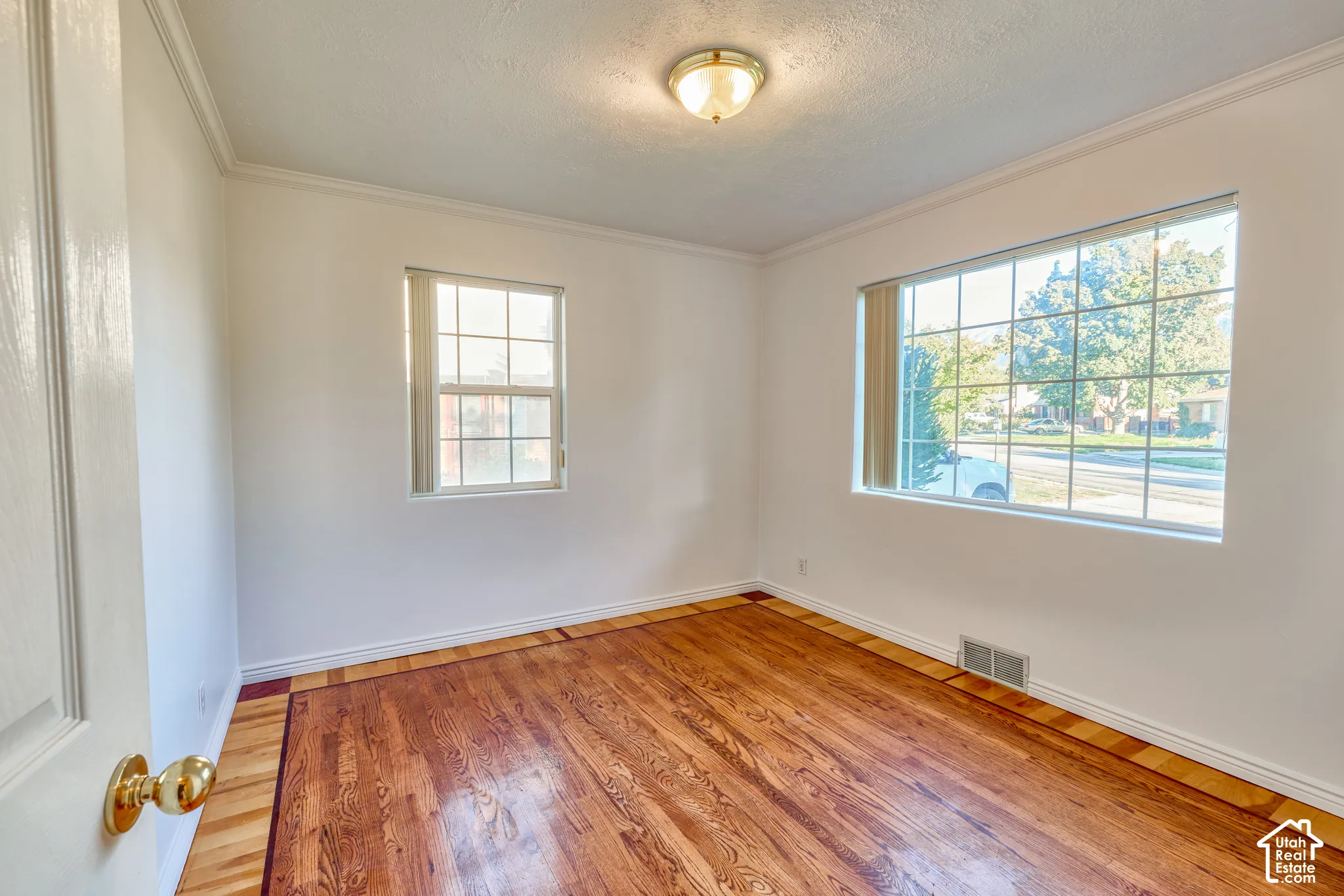 Wood-finish flooring with perimeter detailing