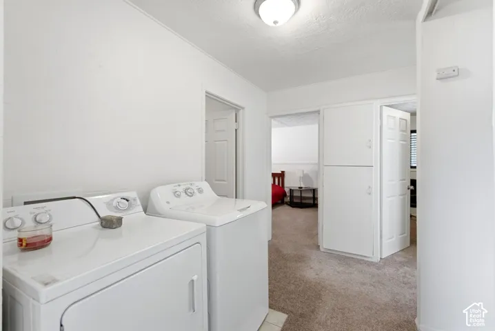 Integrated laundry appliances and built-in storage cabinetry