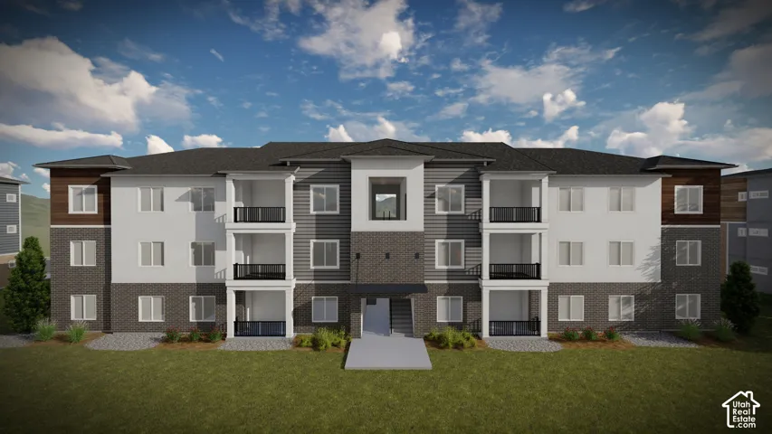 Multi-level residential building featuring a combination of brick, horizontal siding, and textured panels