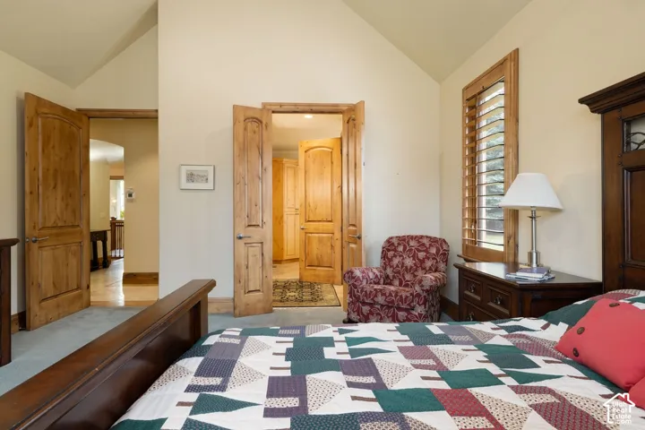 Vaulted ceiling with light-toned walls