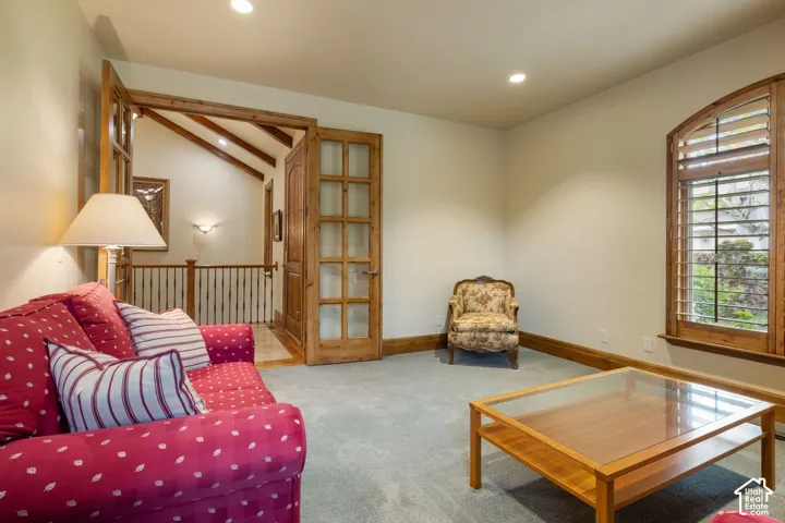 Light-toned walls with recessed lighting