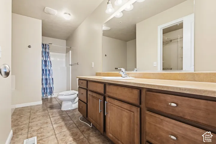 Primary bathroom with tub and separate shower.