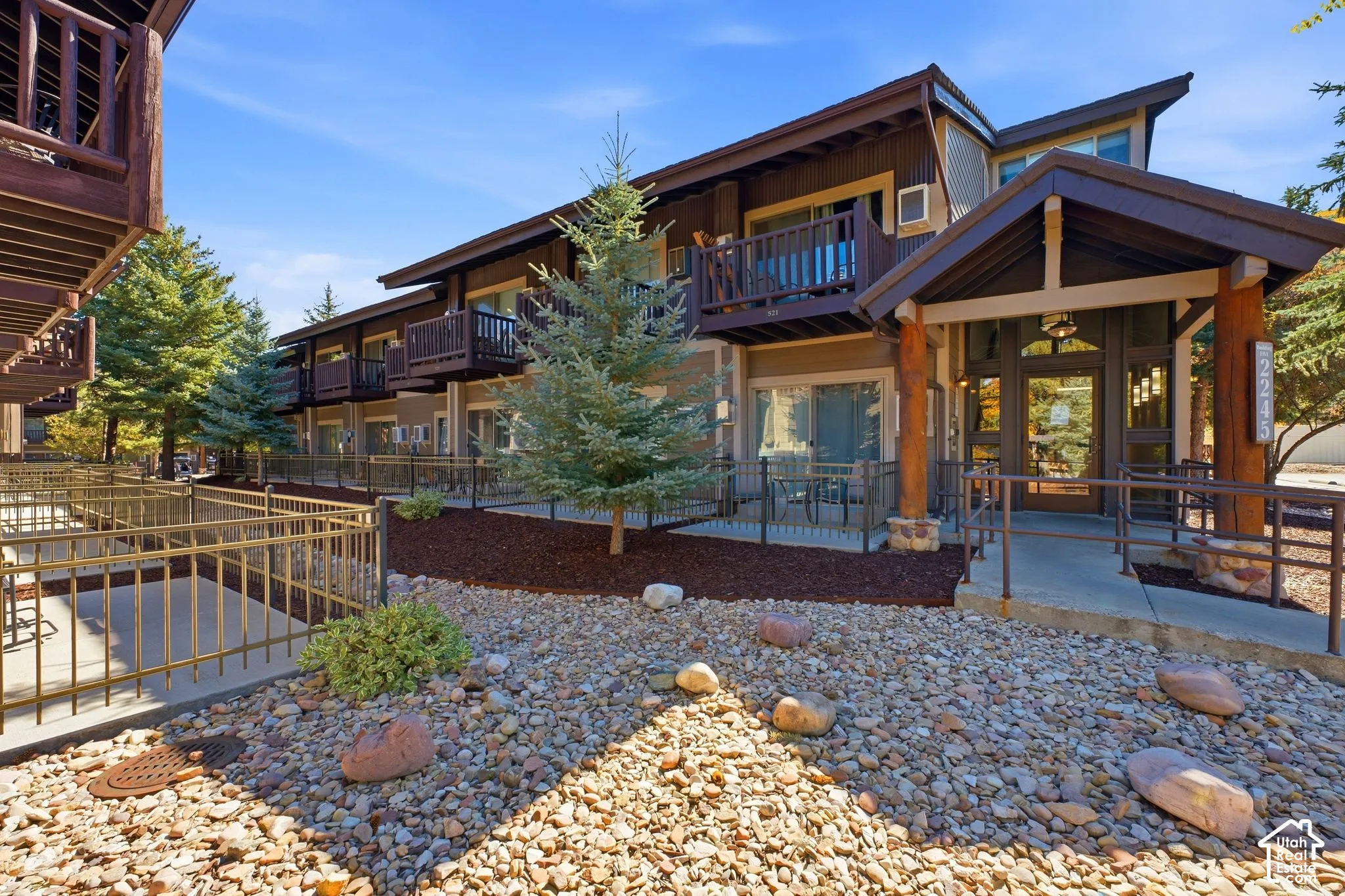 Wood-finish exterior with multiple private balconies