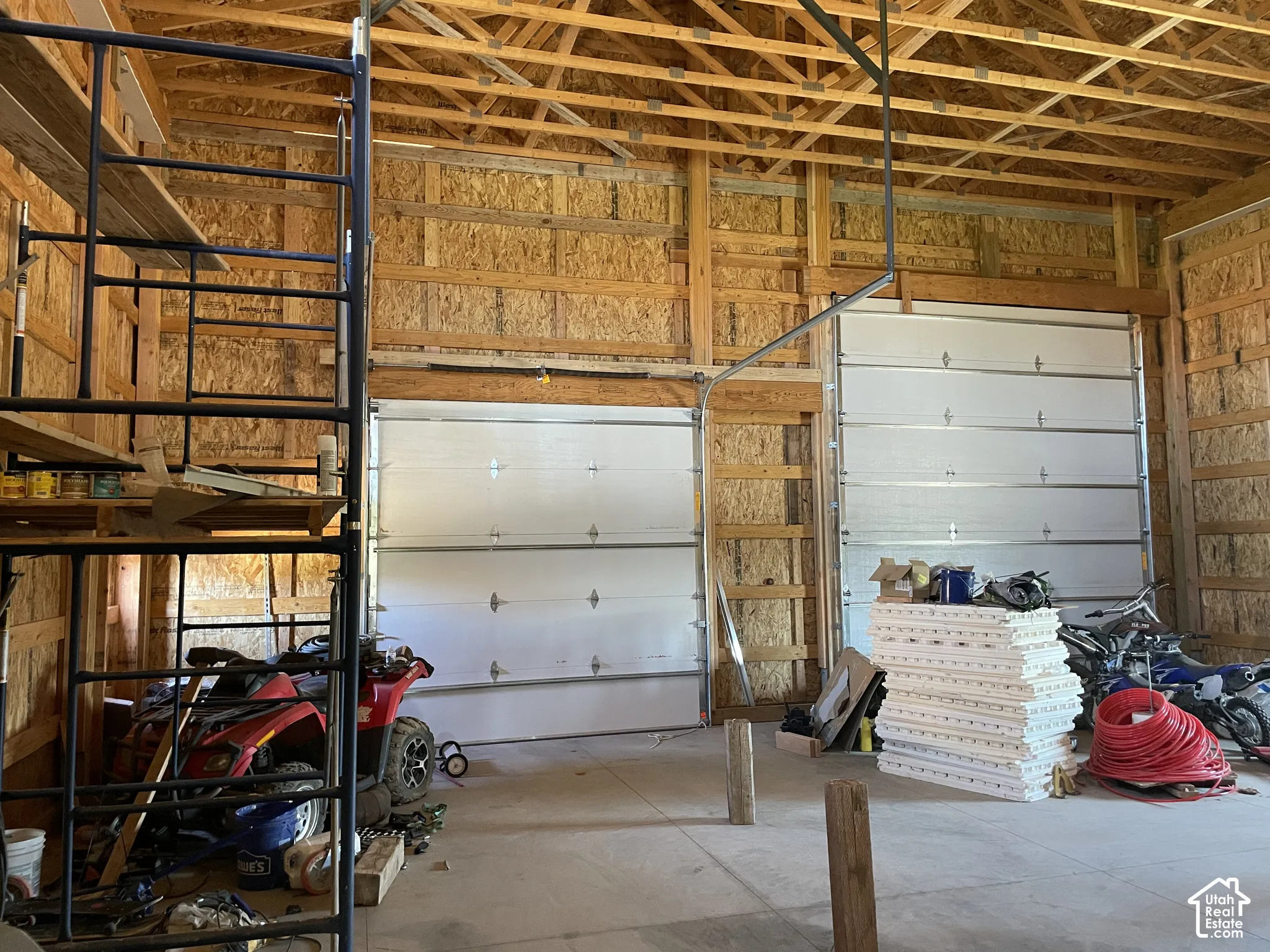 Garage featuring 10' door and 14' door