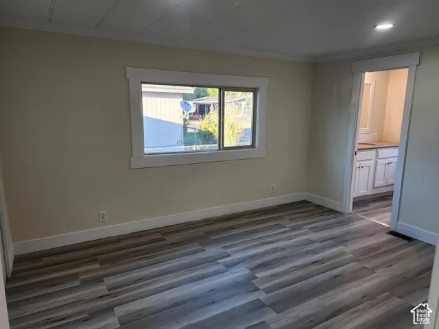 Wood-finish plank flooring throughout