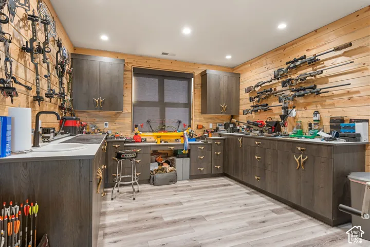 Extensive built-in cabinetry with unique gold-tone hardware