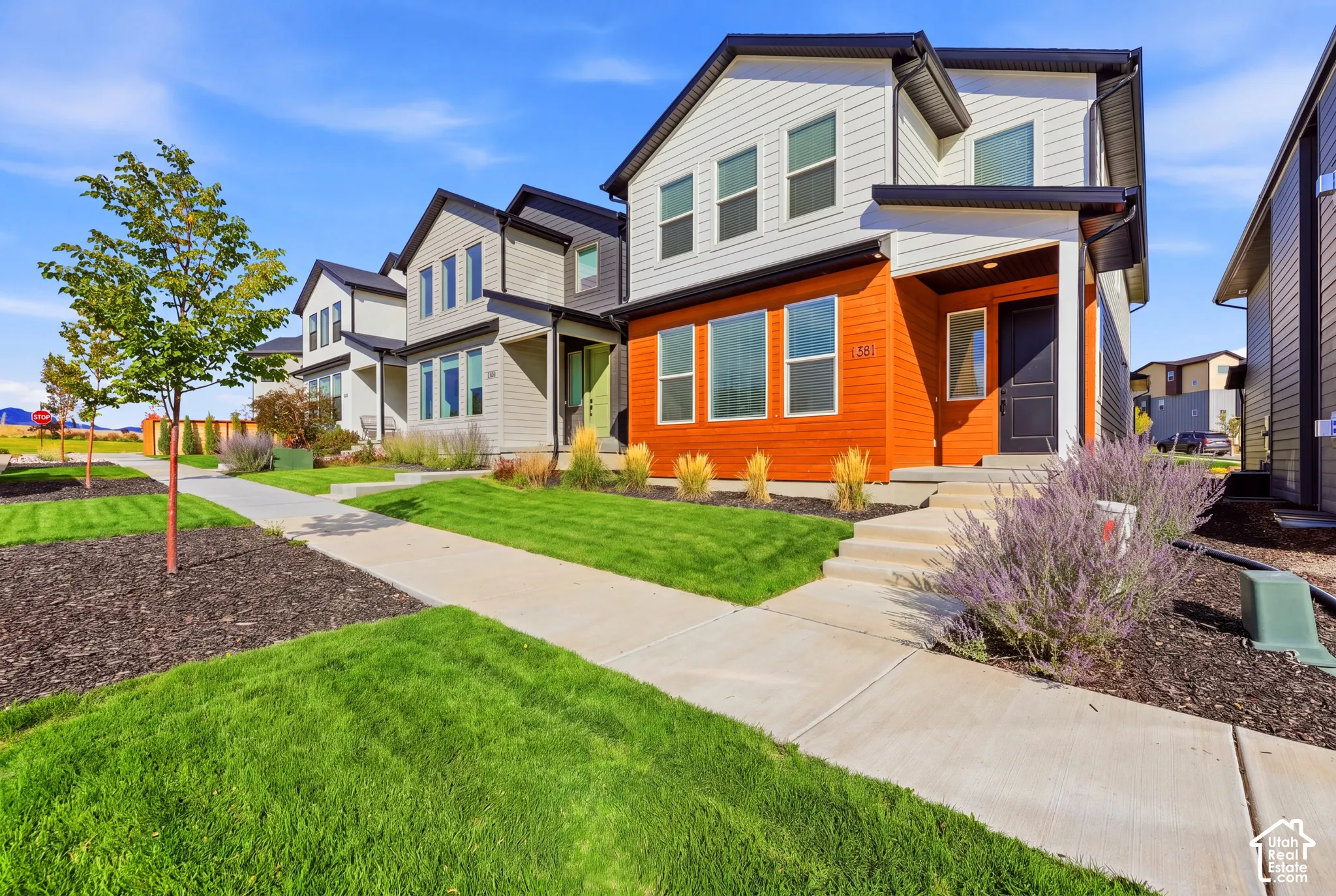 Contemporary exterior with horizontal siding and accent paneling