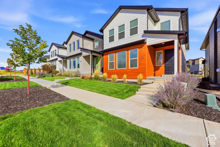Contemporary exterior with horizontal siding and accent paneling