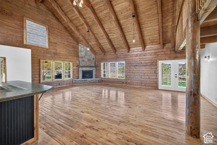 Vaulted wood-paneled ceiling with exposed beams