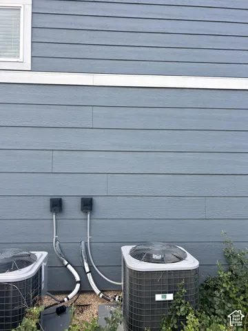 Blue horizontal siding with white trim