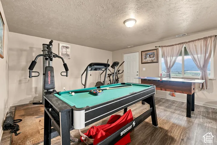 Wood-finish flooring throughout the space