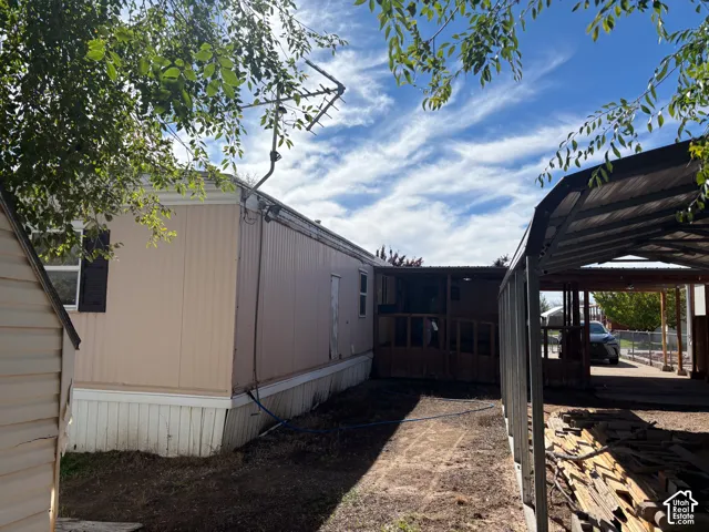 Attached carport structure
