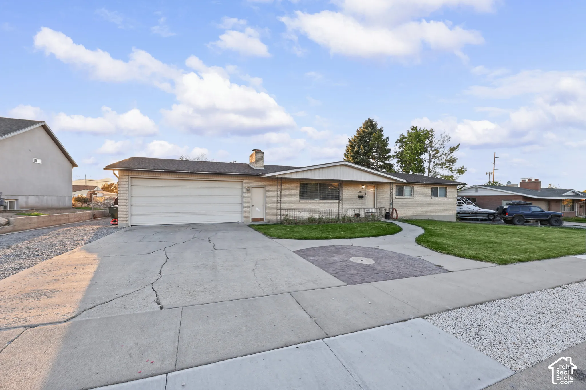 Brick exterior with attached garage