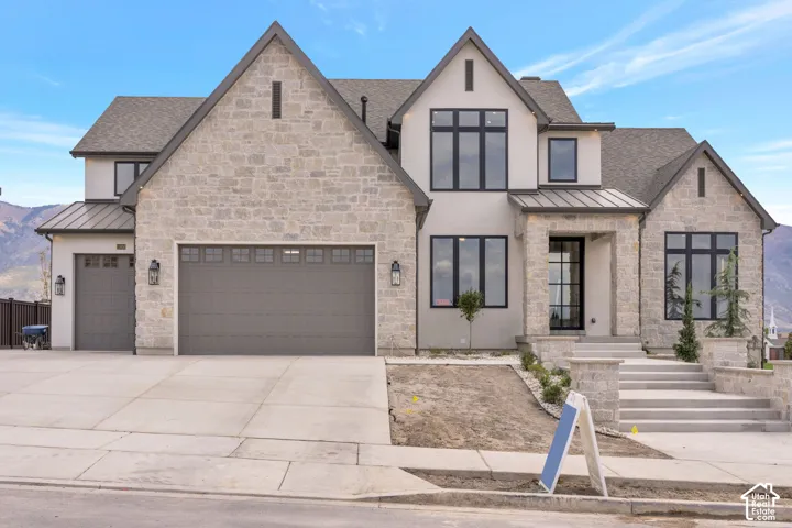 Stone exterior with stucco accents