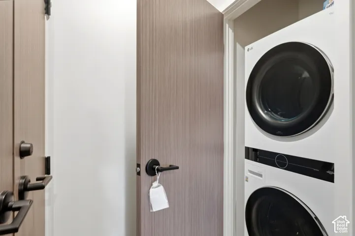 Integrated stacked washer and dryer