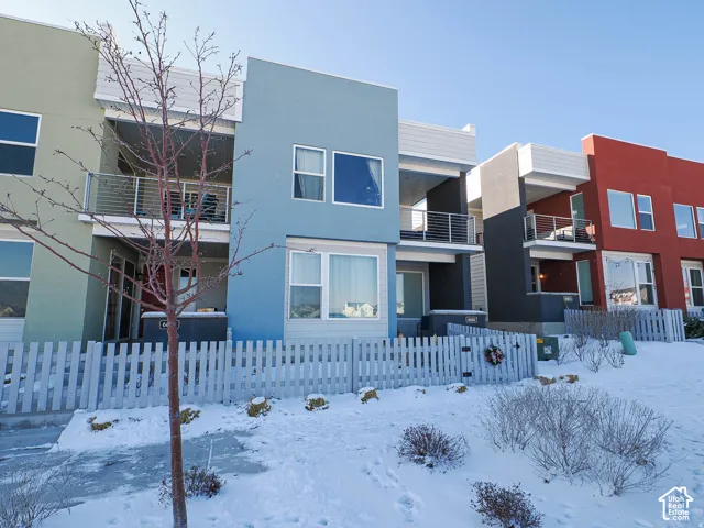 Contemporary multi-level exterior with stucco finish