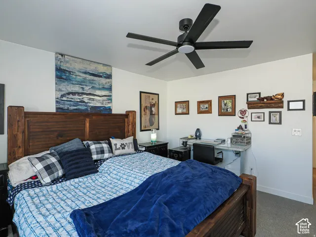 Recessed lighting, ceiling fan with integrated light, wood-finish flooring