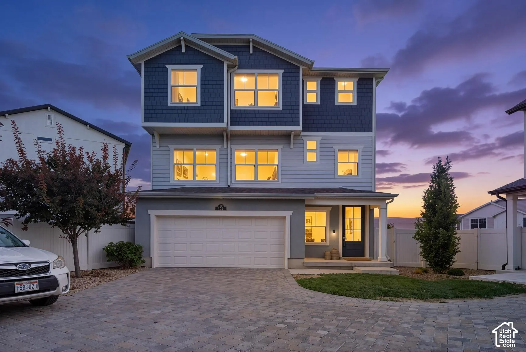 Multi-level exterior with mixed siding and shake accents