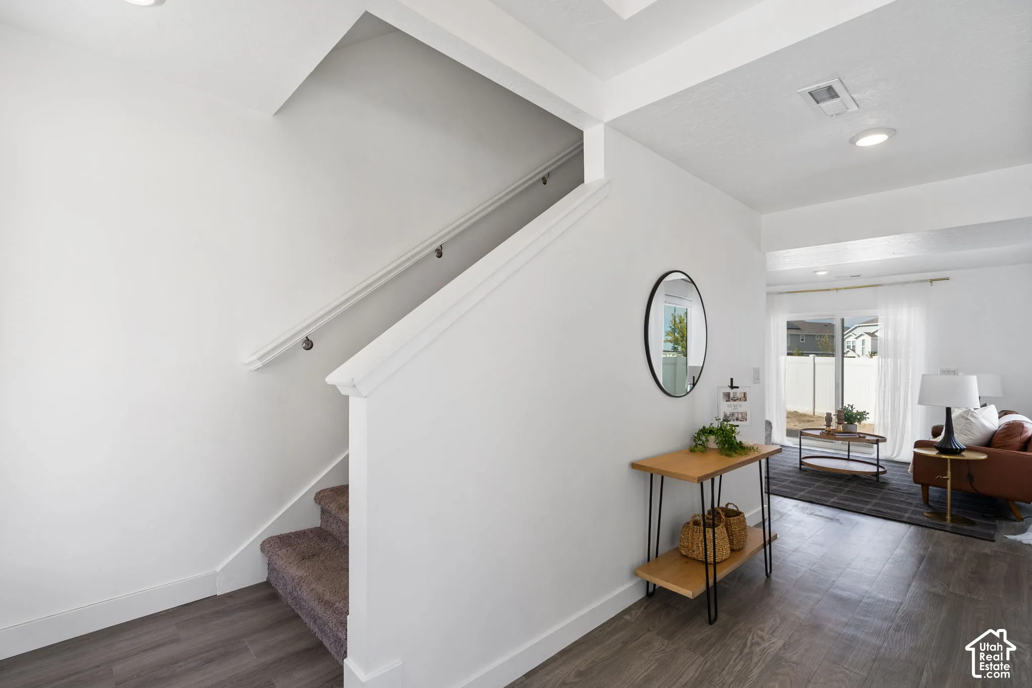 Wood-finish flooring throughout the main level