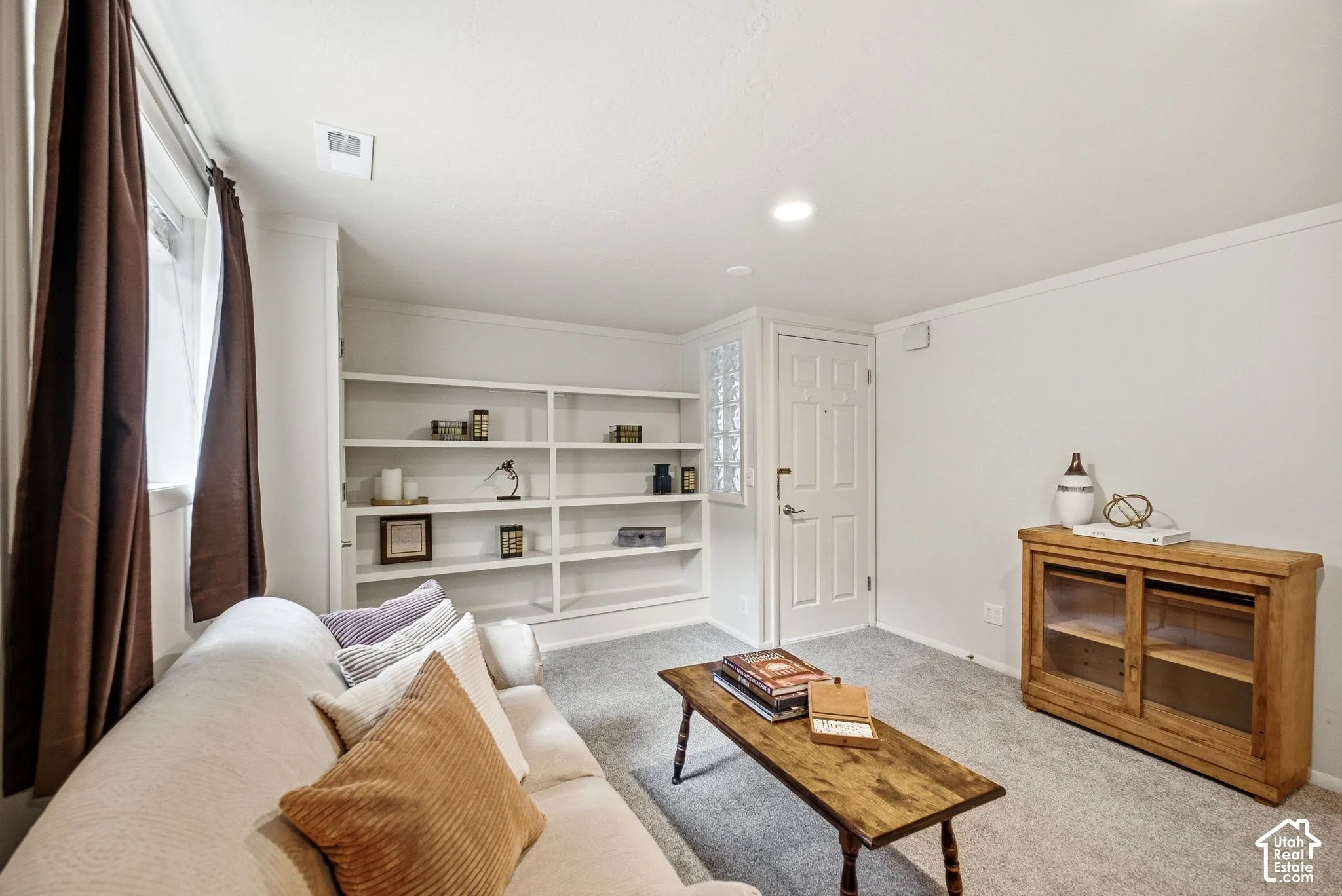 Mother in Law appt with built-in shelving, separate entrance, recessed lighting, and light gray carpet