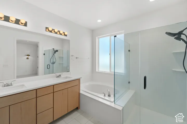 Dual vanity with undermount sinks and wood-finish cabinetry