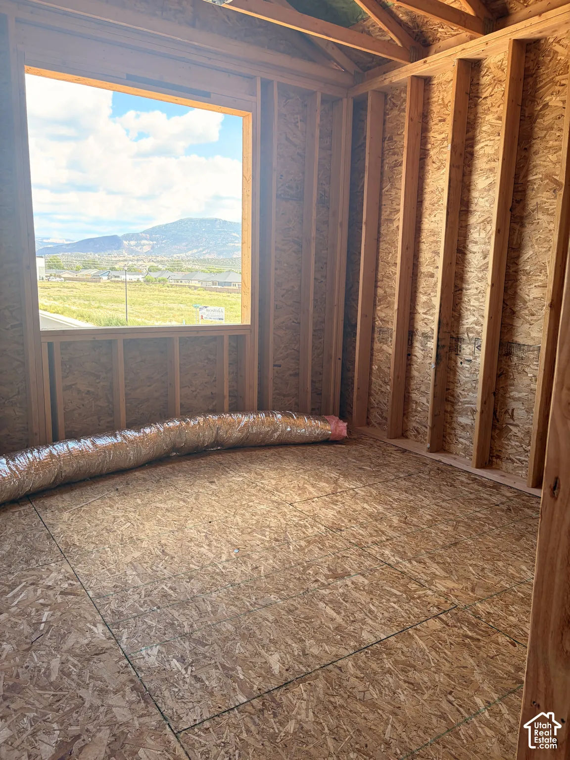 Framed interior room with an expansive window