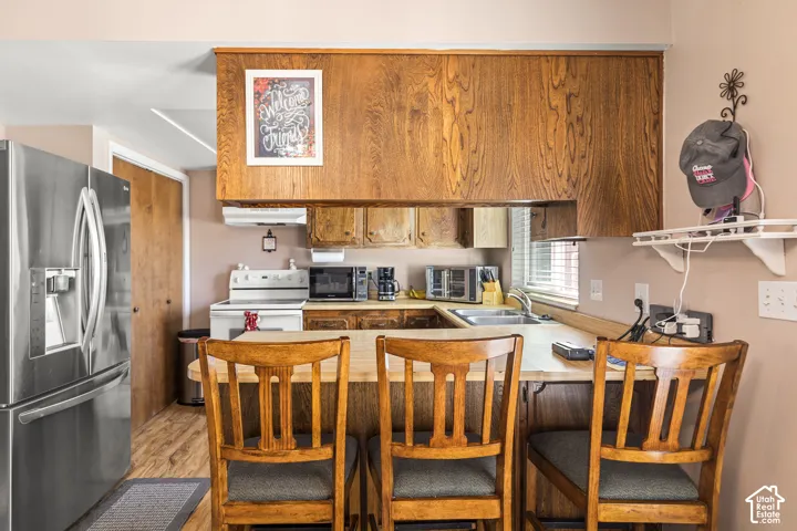 Wood-finish cabinetry paired with light-toned countertops