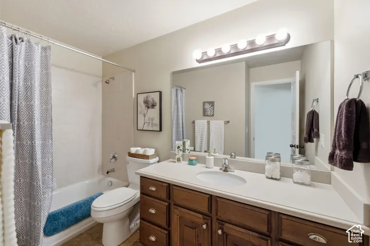 White subway tile shower surround with a built-in tub