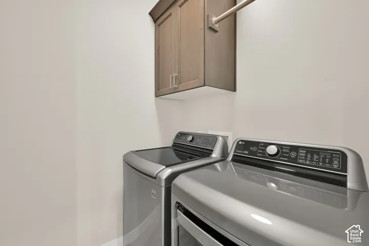 clothes line and storage in the laundry rooom