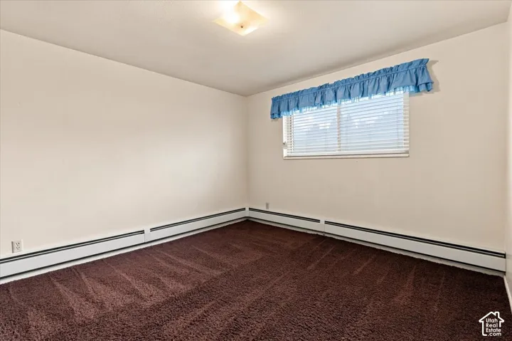 Wall-to-wall carpeting with a neutral wall color, providing a versatile palette