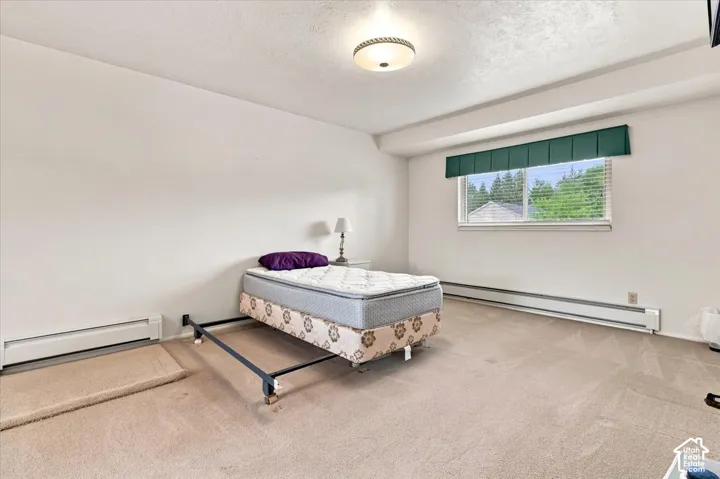 Generous room dimensions with neutral wall tones