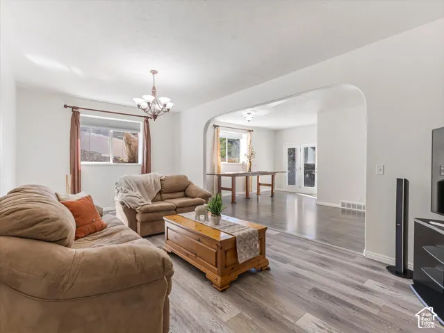 Wood-finish flooring throughout, providing a cohesive aesthetic
