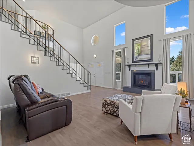 Vaulted ceilings complement the grand staircase with metal balusters