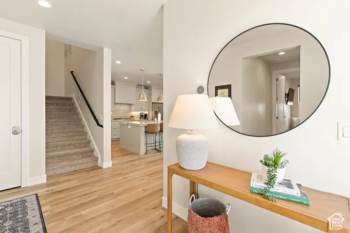 Hardwood-style flooring throughout the entry