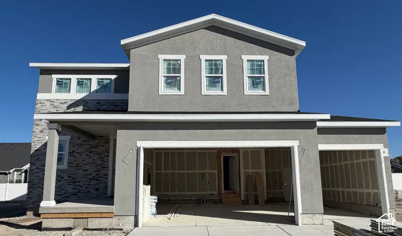 Stucco exterior with stone accent detailing