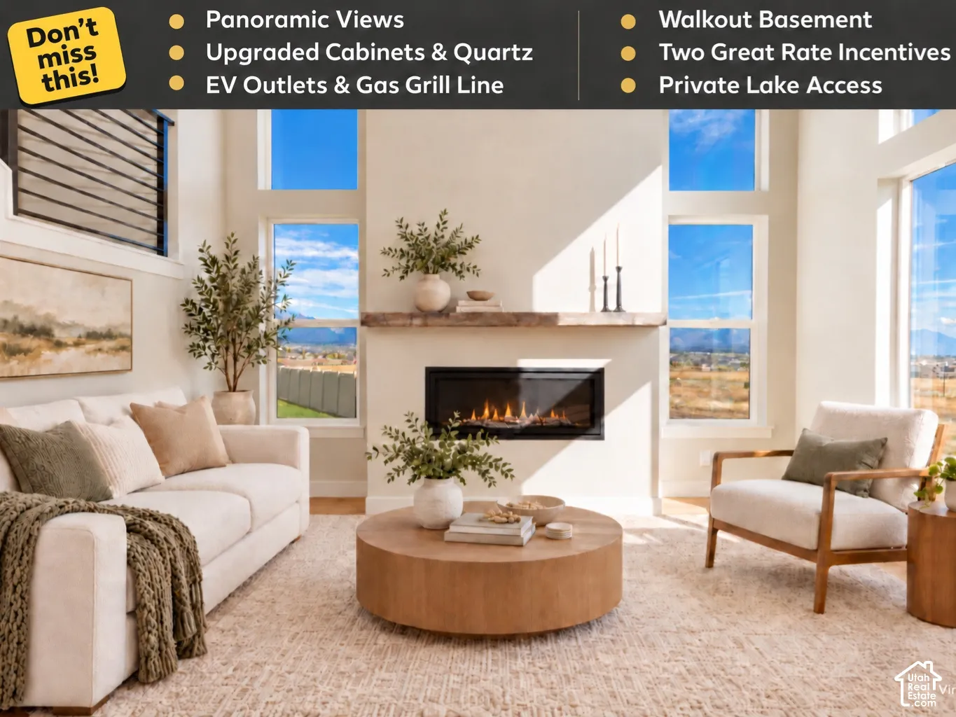 Living area featuring high ceilings, large multi-pane windows, wood-finish flooring, and a linear fireplace with a prominent timber mantel