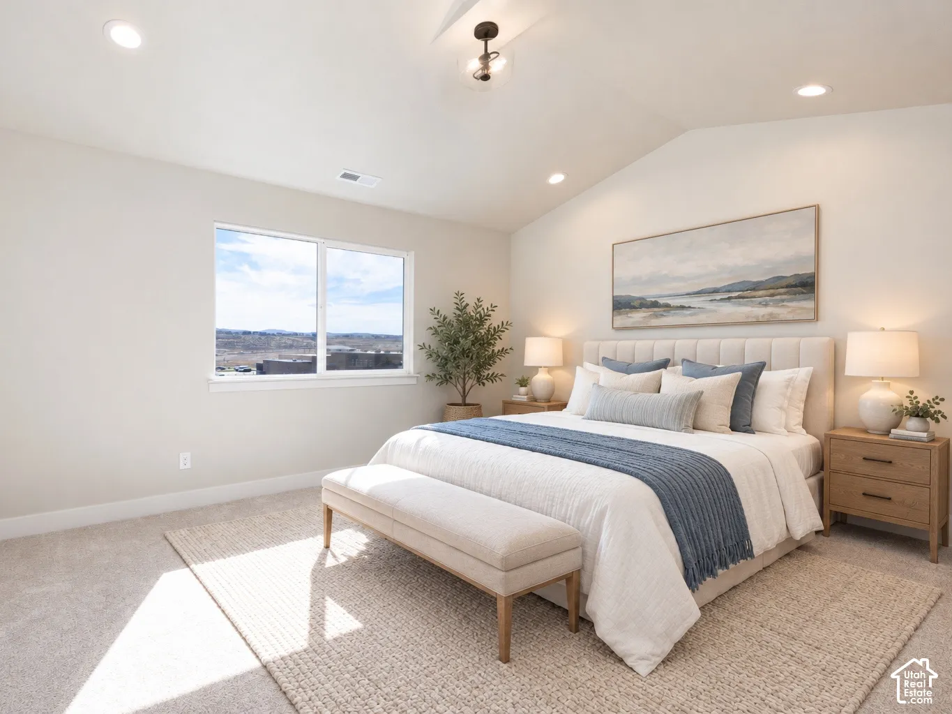 Vaulted ceiling with recessed lighting and a central light fixture.  Virtually Staged.