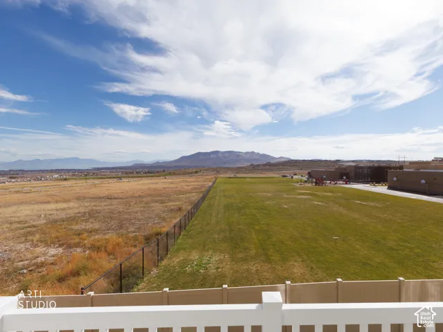 Expansive open sky, distant mountains, and a clear horizon