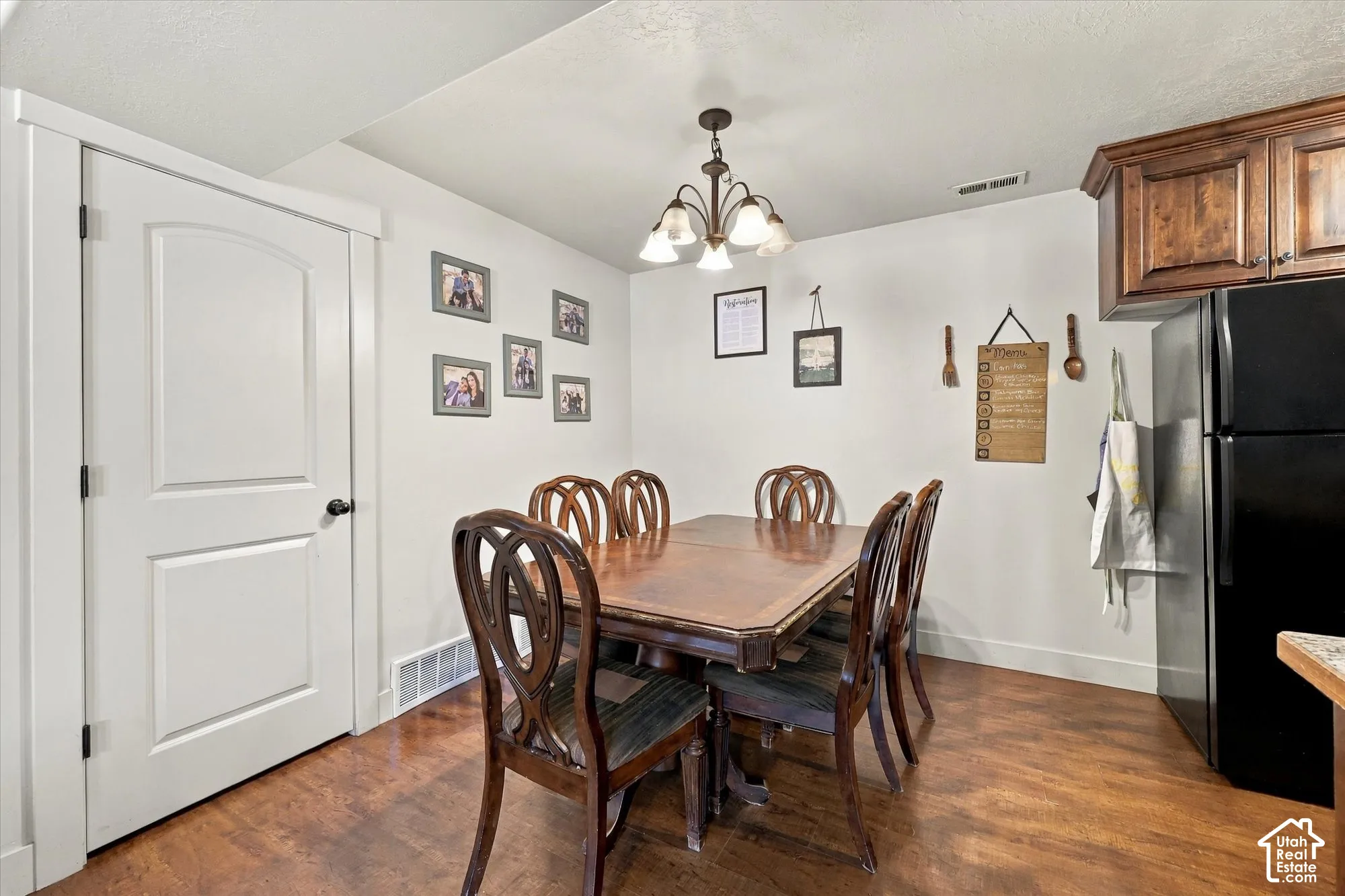 White walls complement wood-finish flooring
