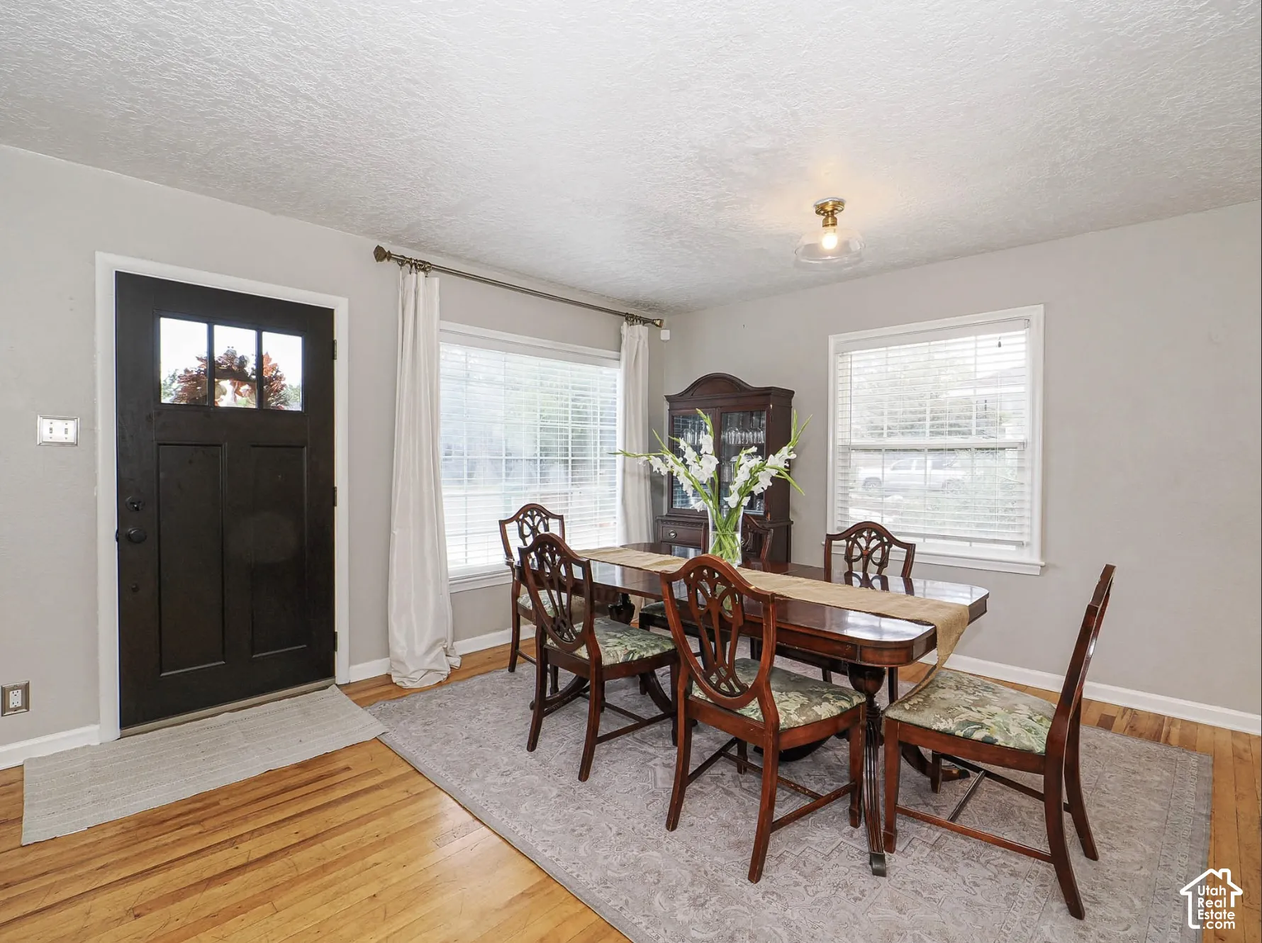 Wood-finish flooring with a light gray wall color