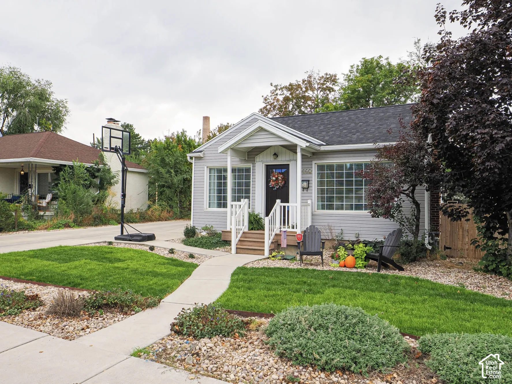 Light gray siding exterior with white trim