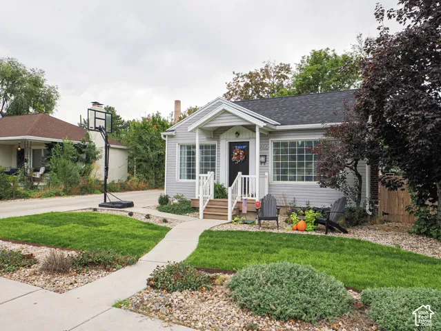 Light gray siding exterior with white trim
